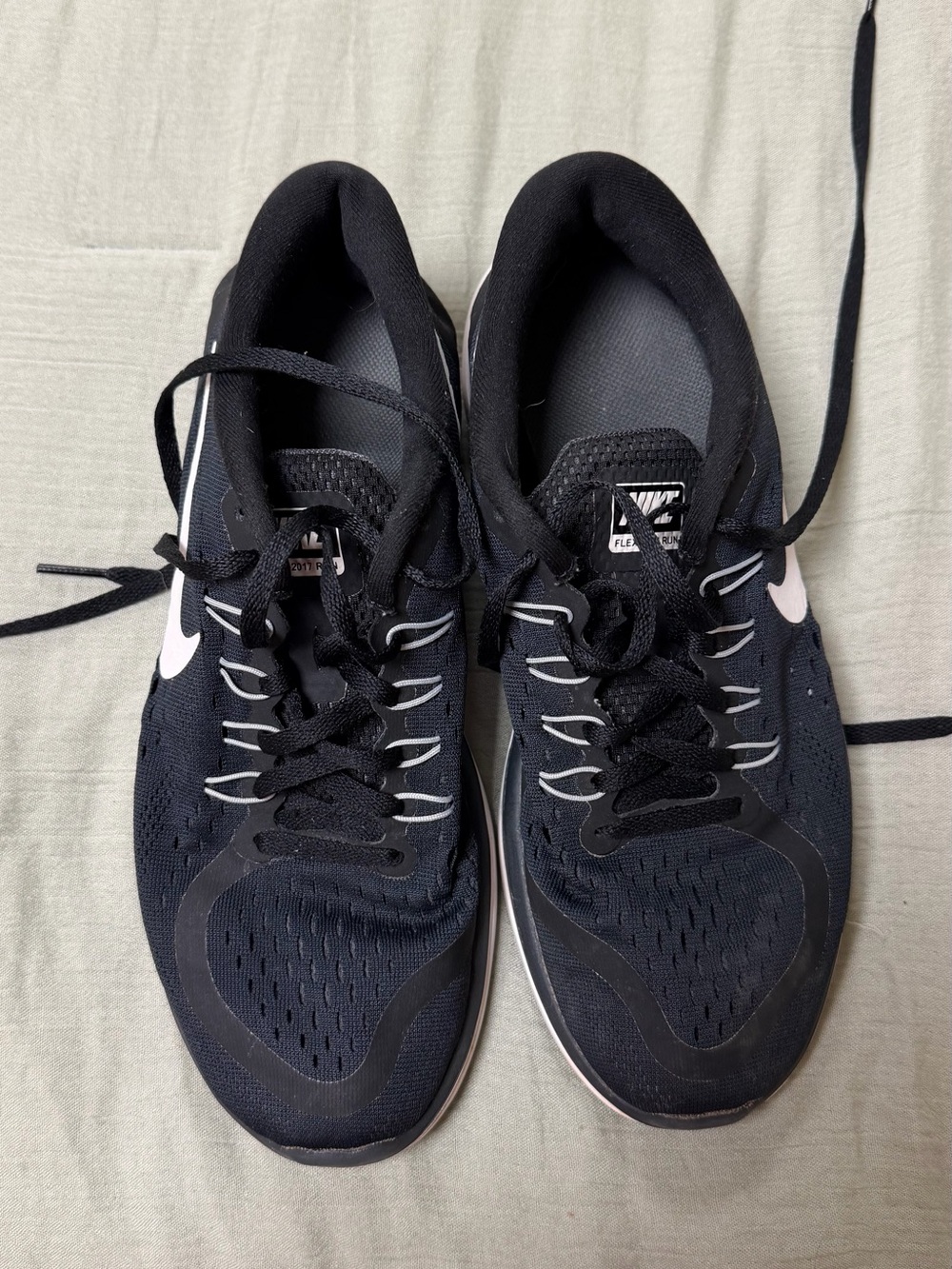 Nike Women's Black Sneakers with White Swoosh